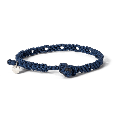 Handwoven friendship bracelet made of navy blue cord – craft by loommii