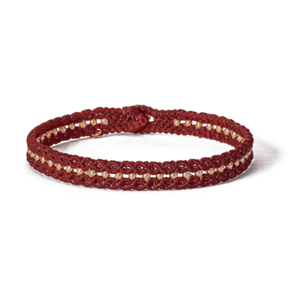 Handwoven friendship bracelet made of deep ember red cord – craft by loommii